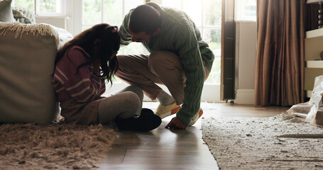 Sad, child and father with comfort in home for mental health support, mourning and grieving loss....