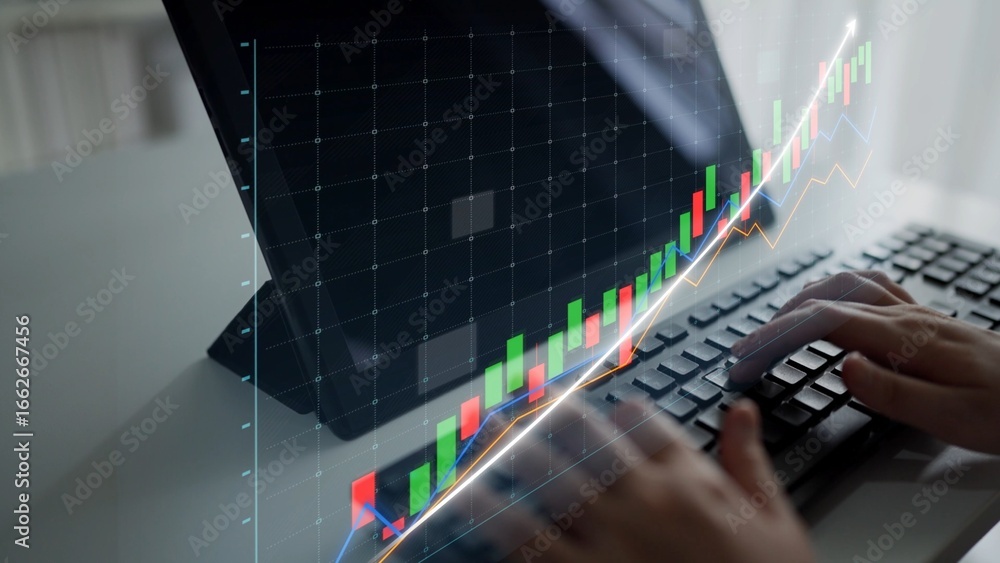 Poster close-up of a laptop keyboard with hands typing, featuring a dynamic stock chart overlay that illust