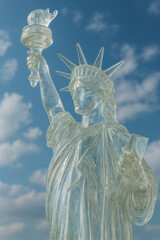 Fototapeta premium Clear glass statue of liberty against bright blue sky with clouds representing transparency freedom and american symbolism