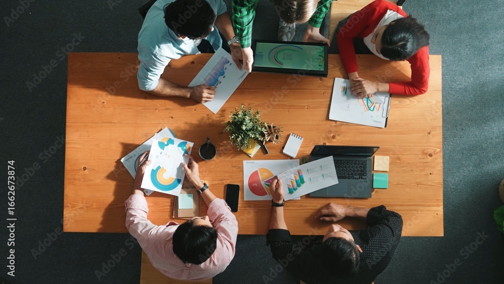Aufkleber top down view of business woman explain and present financial chart. diverse group discuss and liste
