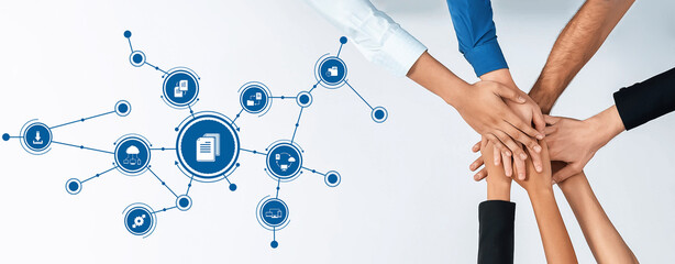 This image showcases a diverse group of hands united in collaboration, symbolizing teamwork and strategic planning in business management for project success. Amity