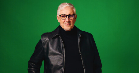 Studio, portrait and mature man with glasses, private investigator or determined to solve cold...