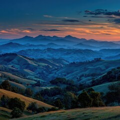 Misty mountain range at sunrise