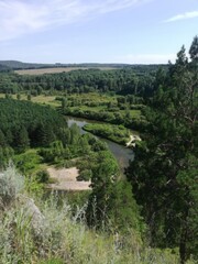 Picturesque River Valley Vista Lush Greenery, Tranquil Waters, and Scenic Landscape Beauty.