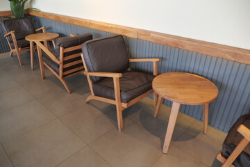 Fototapeta premium Cozy seating arrangement in a modern cafe space