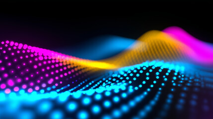 Colorful wave of glowing LED dots on black background creating futuristic digital pattern.  

