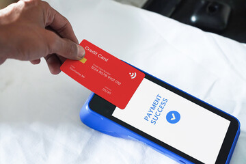 Image of a successful credit card transaction using the NFC feature. Fintech Concept