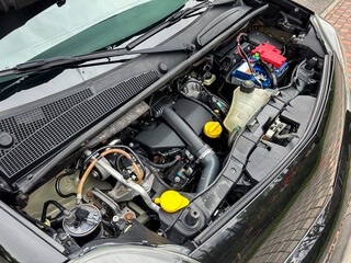 This is a detailed view showcasing the intricate components of a modern engine compartment...