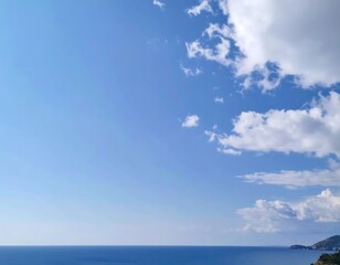 Fototapeta premium Vast blue sky over tranquil sea