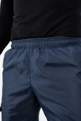 Stylish Athletic Wear CloseUp Featuring Comfortable Navy Performance Pants paired perfectly with a...