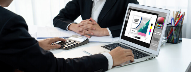 Graphic designer software for modern design of web page and commercial brisk ads showing on the...