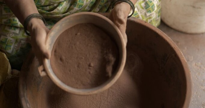 Ganesh Idol Making: Indian Woman Artist Sieving Clay Traditionally