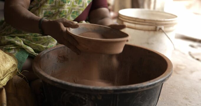 Ganesh Idol Making: Indian Woman Artist Sieving Clay Traditionally