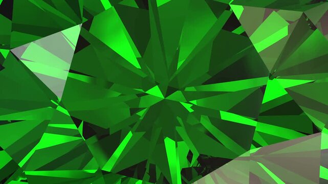 Green emerald close-up.  Top view, looping animation