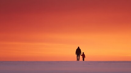Silhouette of Parent and Child Walking Against Vibrant Sunset Sky