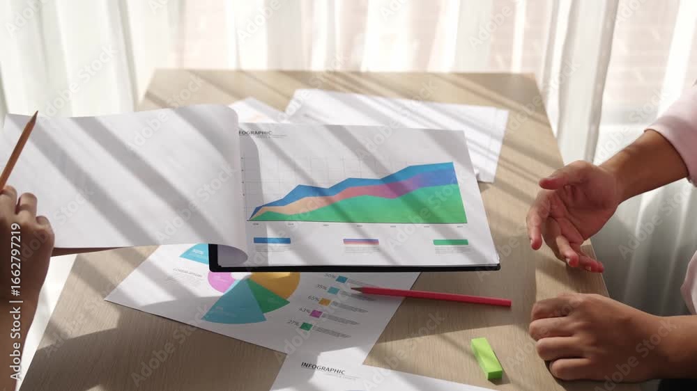 Poster startup company employee work together, analyze colorful bi dashboard paper with financial data repo