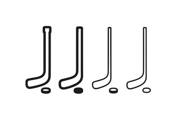 Different types of hockey sticks and puck positioning during a game practice session
