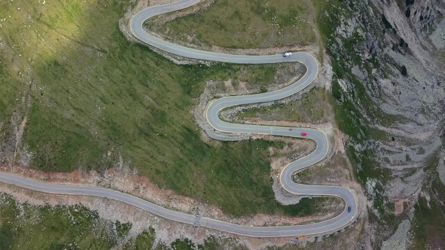 A drone top down view of the Transapline road running through the Carpathians in Romania.
