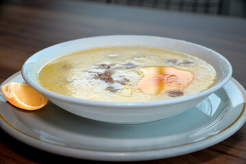 Sheep's head and foot Soup plate on table in restaurant