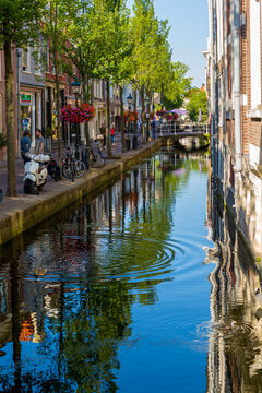 Delft, Netherlands - July 03, 2018: View to the street in the historic center of Delft