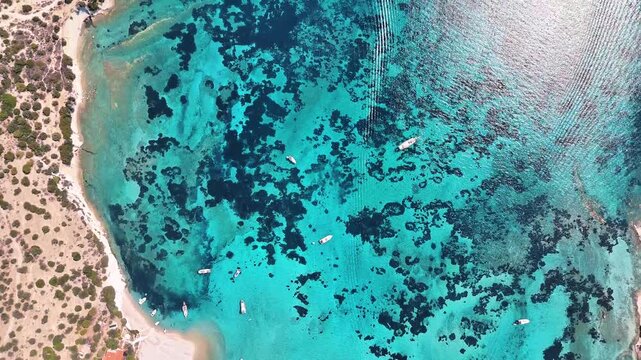 4k drone video of Garip and Kalem islands with turquoise sea and coral reefs in Bademli. Dikili, a district of Izmir famous for its turquoise sea in Turkiye.