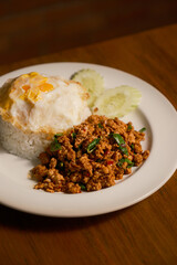 Classic Thai Basil Pork (Pad Krapow Moo Saap) with Fried Egg and Jasmine Rice. A beloved, spicy, and savory Thai street food dish, perfect for a quick and delicious meal.