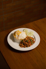 Classic Thai Basil Pork (Pad Krapow Moo Saap) with Fried Egg and Jasmine Rice. A beloved, spicy, and savory Thai street food dish, perfect for a quick and delicious meal.
