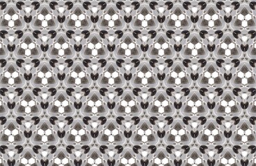 Mesmerizing geometric kaleidoscope pattern in monochrome tones. A seamless and symmetrical abstract...