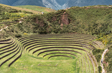 Scenic view with the circular agricultural terraces of Moray an Inca archaeological site in the Sacred Valley of Peru.