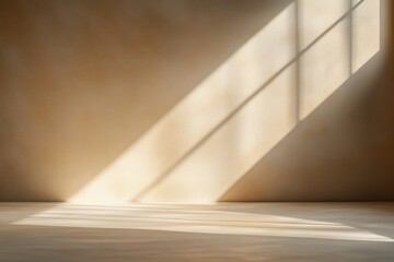 Sunlight streaming through a window casting soft geometric shadows on a plain beige wall and floor creating a warm and calm atmosphere