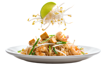 Delicious pad thai with shrimp, garnished with lime and bean sprouts, on a white plate, isolated on white background.