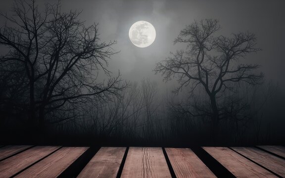 Eerie full moon over wooden deck with bare tree silhouettes