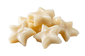 Pile of star-shaped, pale yellow candies