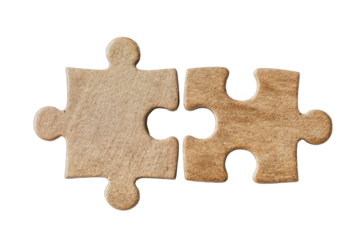 Two light brown puzzle pieces joined