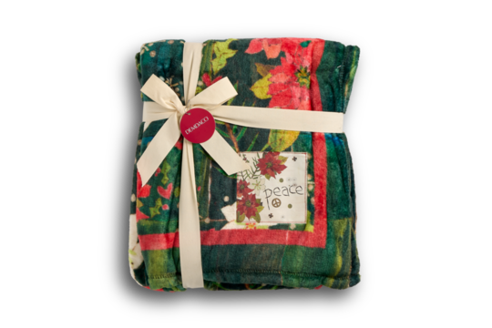Cozy floral blanket for gift giving: A beautifully wrapped blanket with floral patterns and a peace tag, ready to be given as a thoughtful gift. The scene emphasizes the warmth and comfort. 