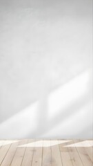 Bright minimalist interior featuring a pristine white wall and warm wooden floor, naturally illuminated by sunlight casting elegant shadows, perfect for a clean and versatile background.