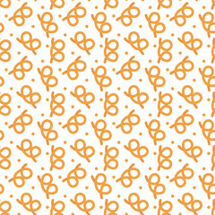 Repeating background of  baked German pretzel bread for bakery, food, and rustic theme.