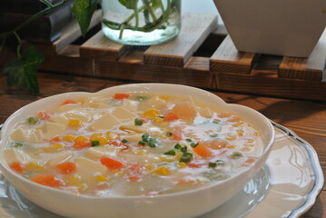 tofu and vegetable soup in a bowl