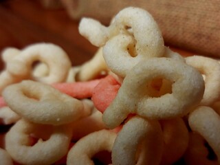 Snack from flour on wooden background