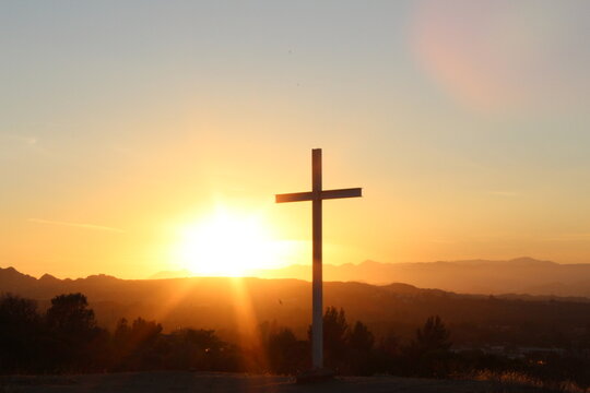 cross at sunset - Powered by Adobe