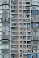 facade of a high-rise building with apartments, full frame, close view