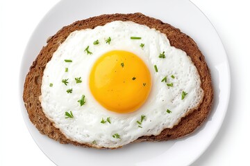 Wholesome breakfast featuring a perfectly cooked sunny side up egg on a slice of whole grain bread garnished with fresh herbs evoking nourishment and simplicity