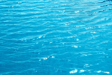 The image is of a calm body of water with a blue color