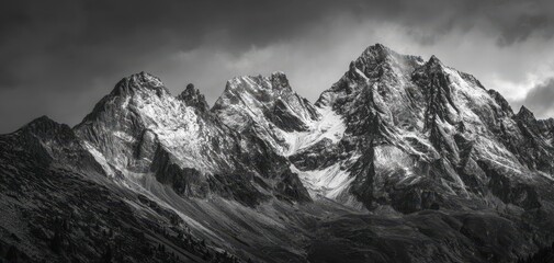 The Majestic Peaks of Nature's Mountain Range Under Dramatic Skies