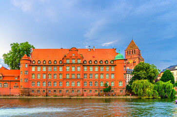 Public Primary School Saint-Thomas Palais de la Monnaie neo-renaissance style in Strasbourg city historic centre on bank River Ill canal in old town Centre Ville, Alsace Grand Est region, France