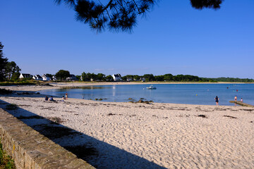 Beach at low tide at Carnac is a commune beside the Gulf of Morbihan on the south coast of Brittany in the Morbihan department in north-western France.