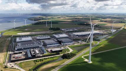 New build data center, computing center in Eemshaven, Groningen, The Netherlands. hyperscaler. - Powered by Adobe