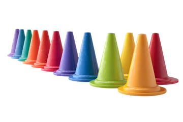 Vibrant multicolored traffic cones lined up artfully displayed for sports and safety training isolated on transparent background