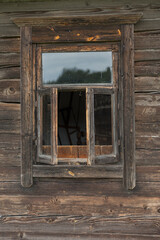an old village window in a wooden house © Татьяна Зернова