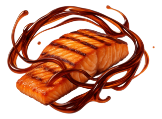 Soy caramel creating a swirling design on a piece of grilled salmon.